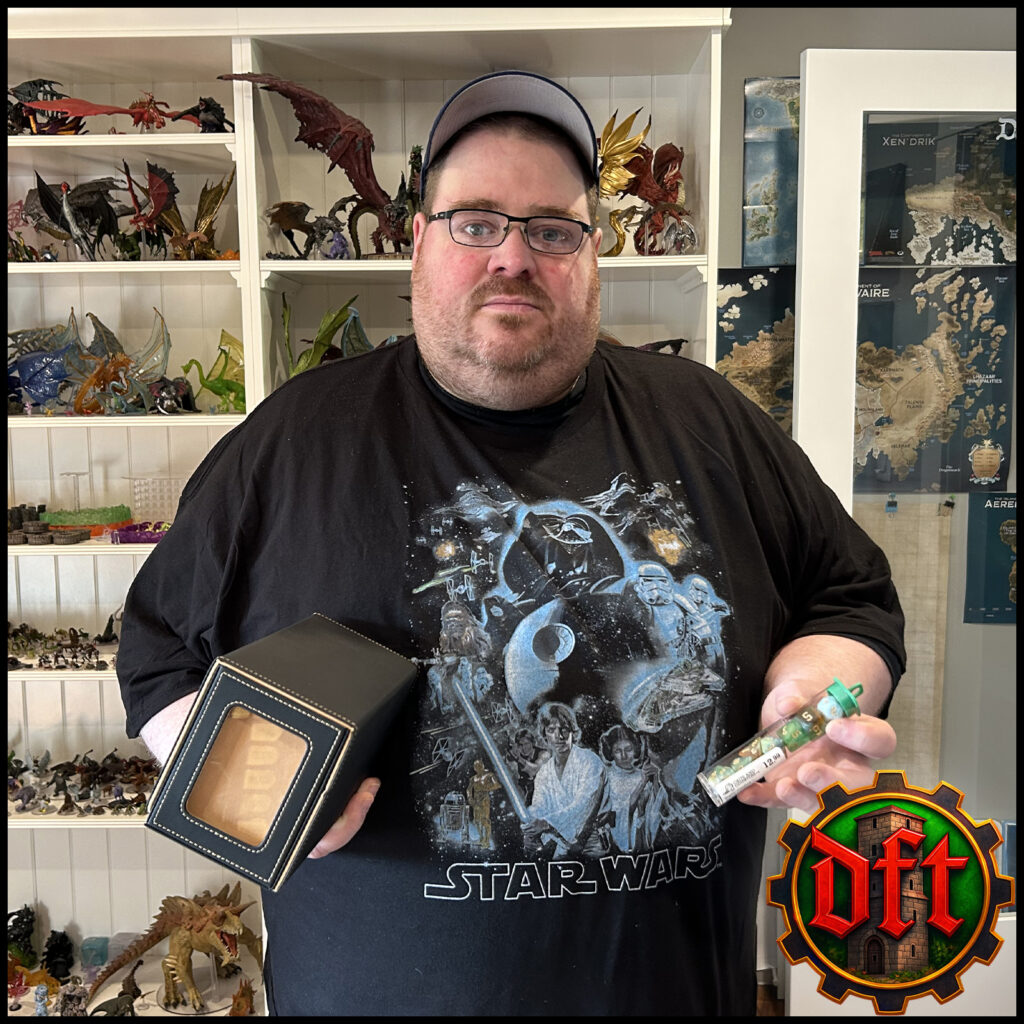Colin B. with his prizes from the June Bog of Holding draw